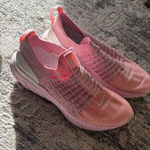 WOMEN’S US 7 | Nike React Pink and White Slip-On Sneakers